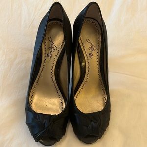 Black satin peep toe pumps with satin knot at toe, 3 1/2” heel
